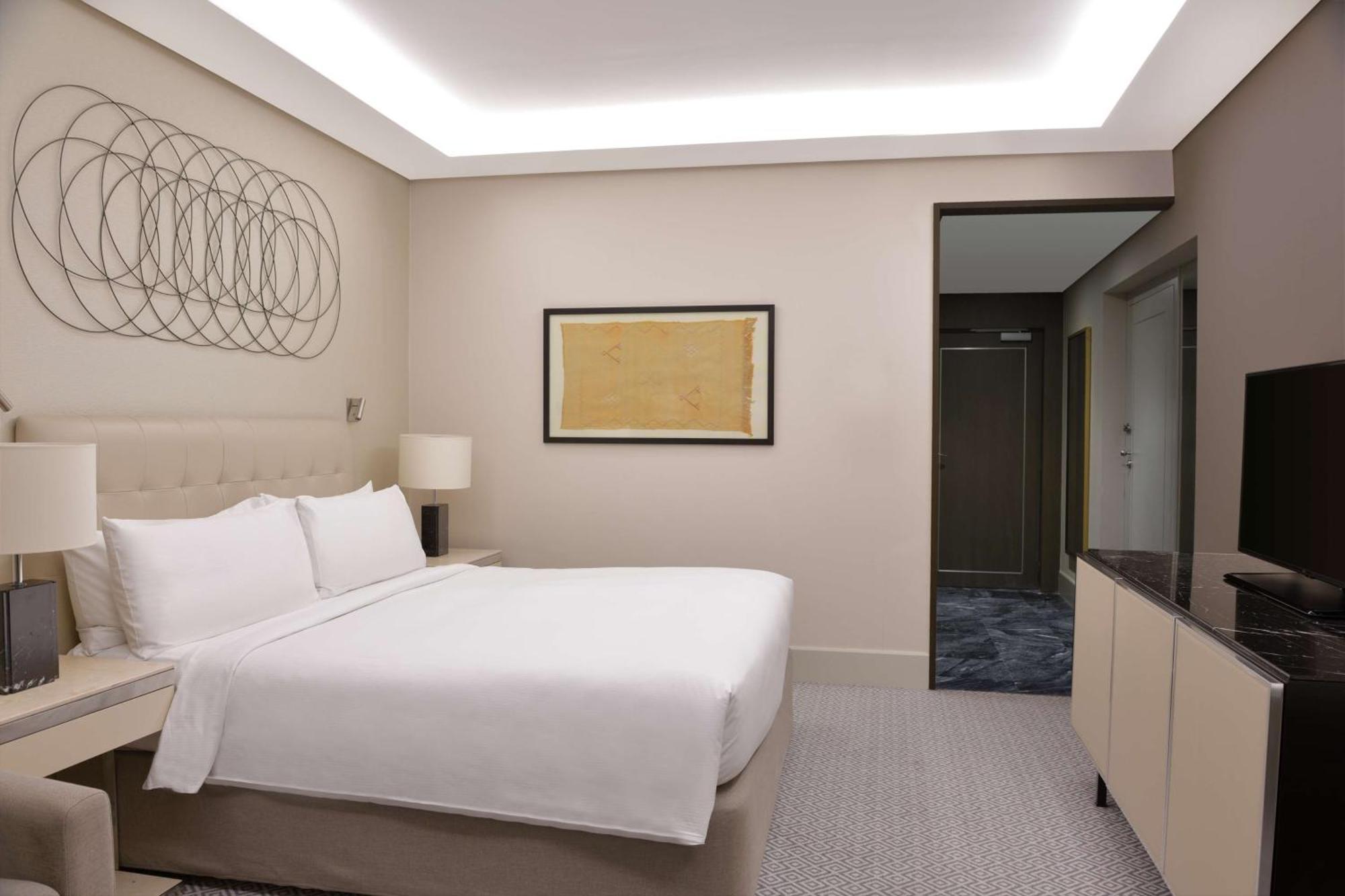 Hilton Tanger City Center Exterior foto A bedroom at the hotel