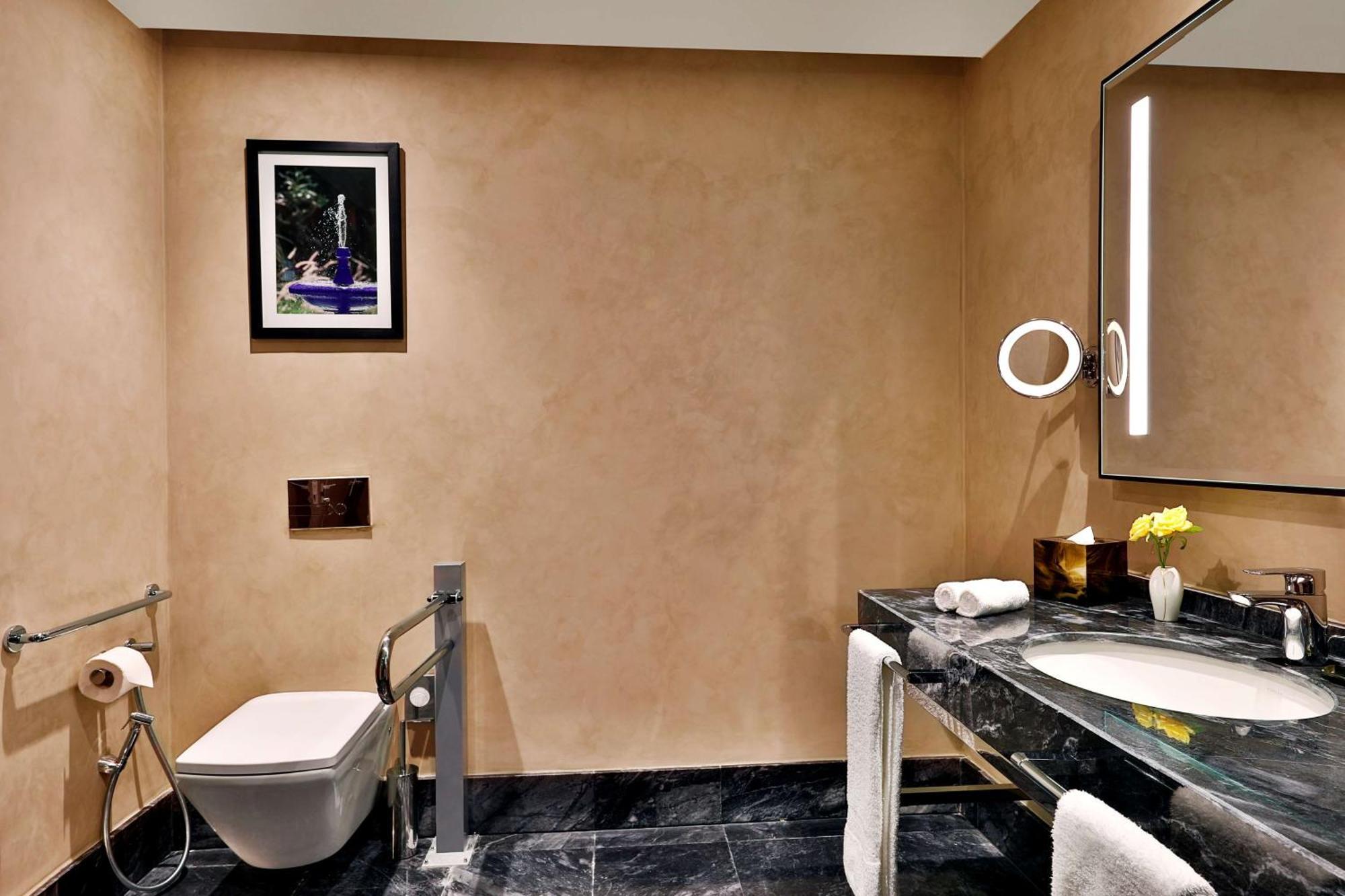 Hilton Tanger City Center Exterior foto A bathroom at the Taj Mahal Palace, Mumbai