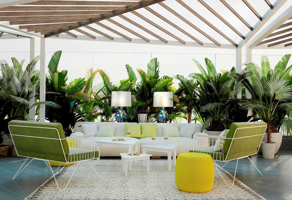 Hilton Tanger City Center Restaurante foto The interior of the hotel